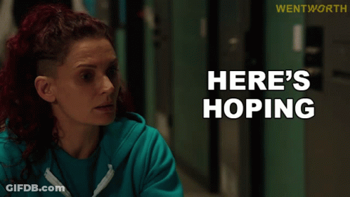Woman In Blue Sweatshirt Says Here's Hoping GIF