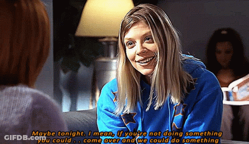 Woman In Blue Sweatshirt Talking To Another Woman GIF