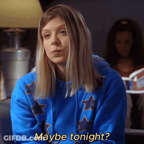 Woman In Blue Sweatshirt With Stars Maybe Tonight GIF