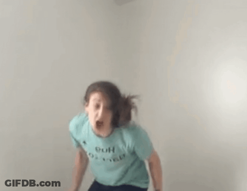 Woman In Blue T-Shirt Jumping GIF