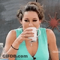 Woman In Blue Tank Drinking From Mug GIF