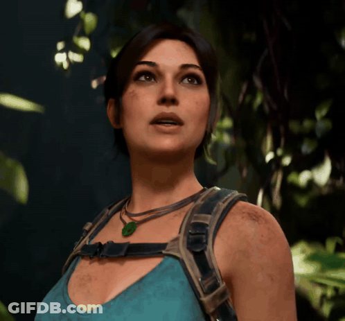 Woman In Blue Tank Top And Green Necklace Looking Up GIF