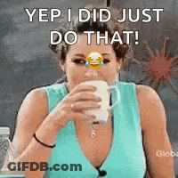Woman In Blue Tank Top Drinking Coffee GIF