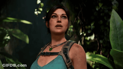 Woman In Blue Tank Top, Green Necklace, Jungle GIF