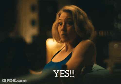 Woman In Blue Tank Top Saying Yes GIF