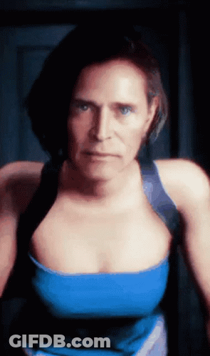 Woman In Blue Tank Top Serious Look GIF
