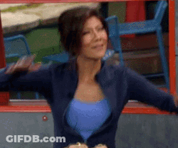 Woman In Blue Top And Jacket Dancing GIF