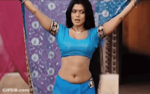 Woman In Blue Top And Shorts Dancing GIF
