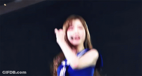 Woman In Blue Top Smiling Waving GIF