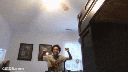 Woman In Blue Wig And White Tank Top GIF
