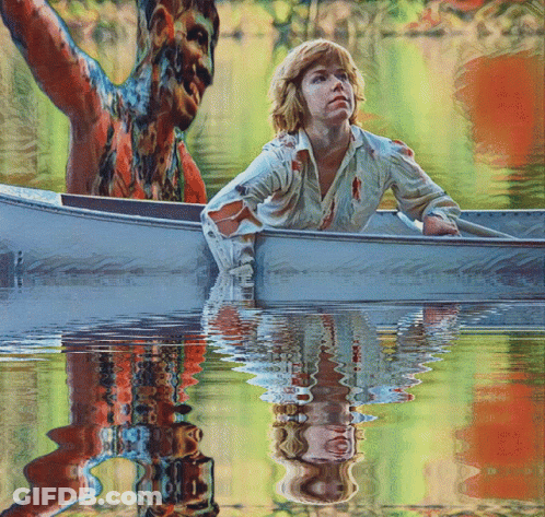 Woman In Boat With Monster Behind GIF