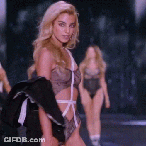 Woman In Bodysuit Walking Runway GIF