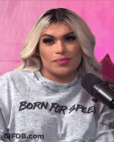 Woman In Born For Speed Sweatshirt At Microphone GIF