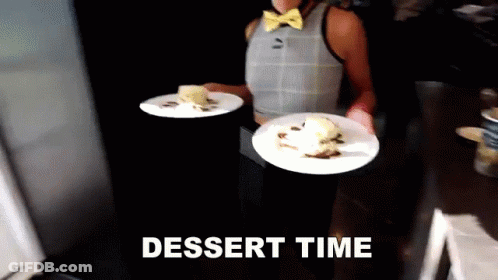 Woman In Bow Tie Carrying Dessert Plates Saying Dessert Time GIF