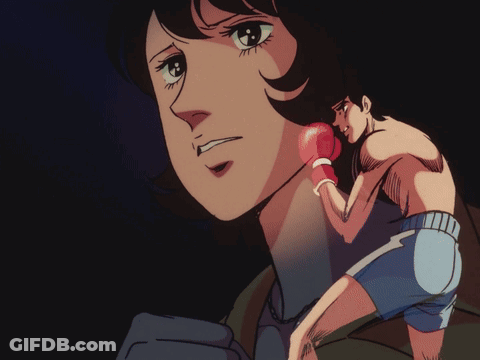 Woman In Boxing Gloves And Man In Shorts GIF
