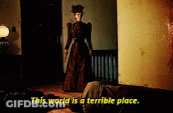 Woman In Brown Dress Holding Knife Saying This World Is A Terrible Place GIF