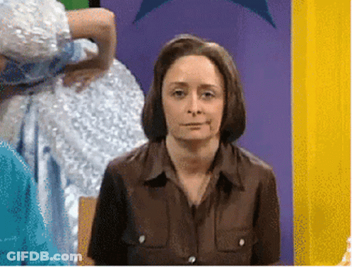 Woman In Brown Shirt Sitting GIF