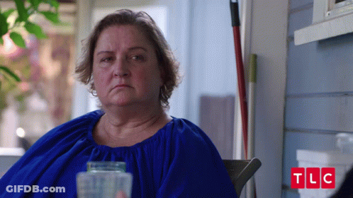 Woman In Brown Shirt Smiling Saying I Make A Slammin PB And J GIF