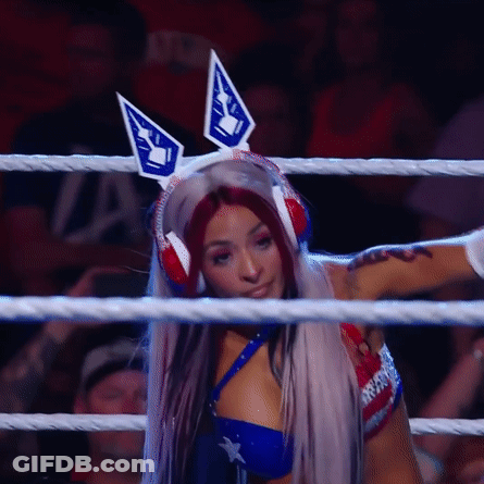 Woman In Bunny Ears And Headphones In Ring GIF
