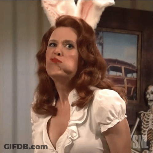 Woman In Bunny Ears And SNL Shirt GIF