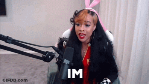 Woman In Bunny Ears At Microphone Saying Im GIF