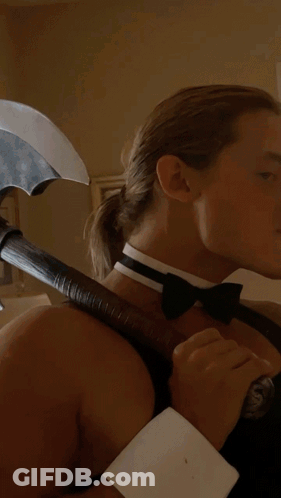 Woman In Bunny Ears Standing In Front Of Bathtub GIF