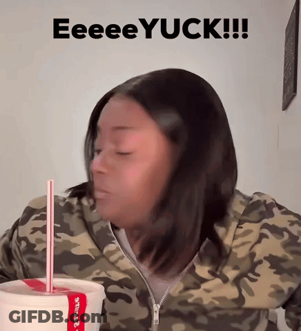 Woman In Camo Jacket Drinking Yuck GIF