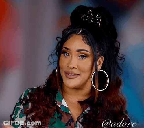 Woman In Camo Shirt And Hoop Earrings @Adore GIF