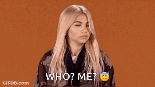 Woman In Camouflage Jacket Asks Who Me GIF