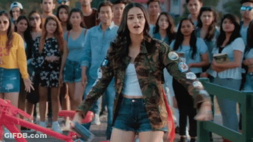 Woman In Camouflage Jacket GIF