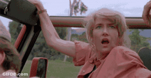 Woman In Car Open Mouth, Man Driving Behind GIF