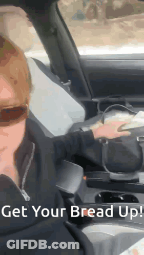 Woman In Car Saying Get Your Bread Up GIF