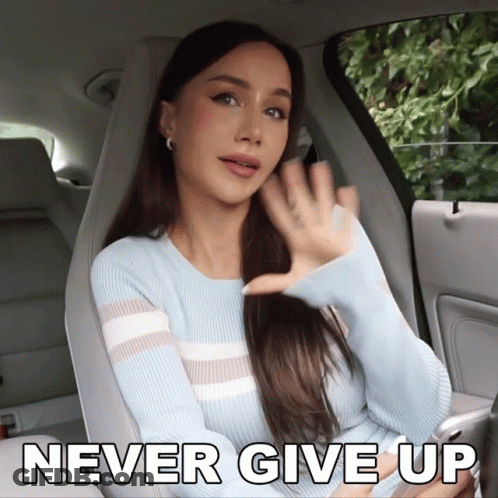 Woman In Car Saying Never Give Up GIF