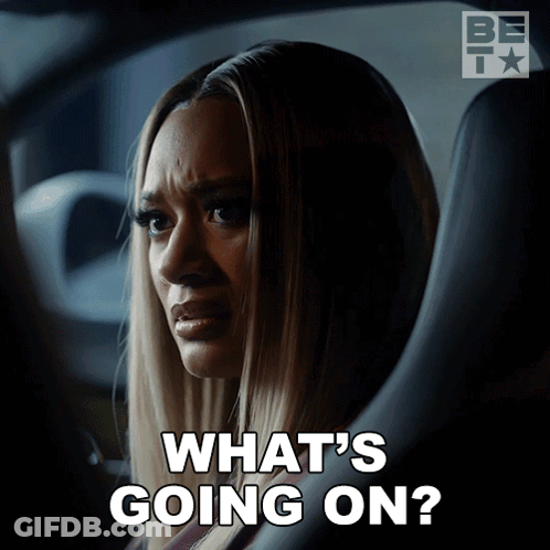Woman In Car Saying What's Going On GIF