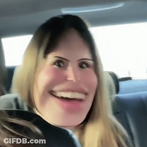 Woman In Car Smiling Funny Face GIF