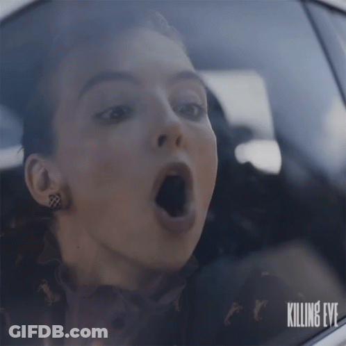 Woman In Car With Killing Eye GIF