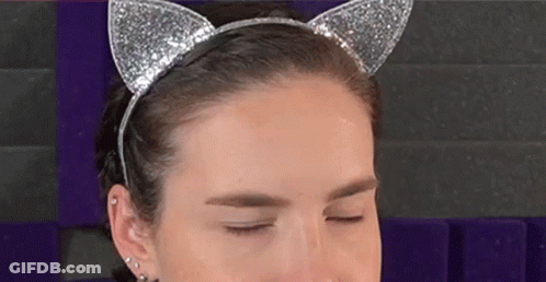 Woman In Cat Ear Headband Making Funny Face GIF