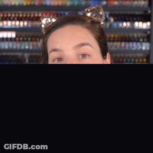 Woman In Cat Ear Headband Says This Year Needs To End GIF