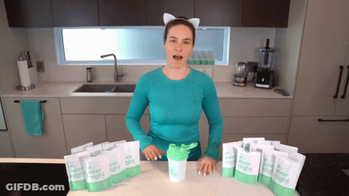 Woman In Cat Ear Headband With Ever Light Packets And Shaker GIF