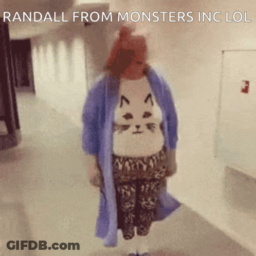 Woman In Cat Sweater Walking Down Hallway Saying Randall From Monsters Inc LOL GIF