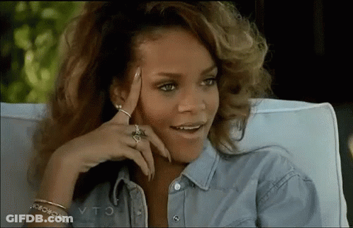 Woman In Chair Hand On Forehead Smiling GIF