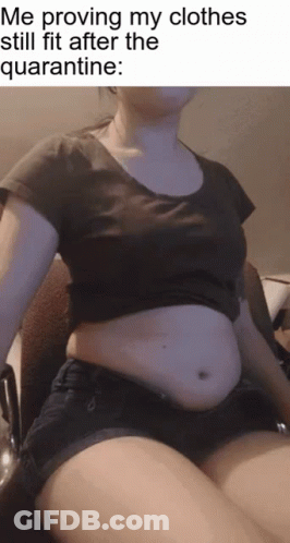 Woman In Chair Proving My Clothes Still Fit GIF