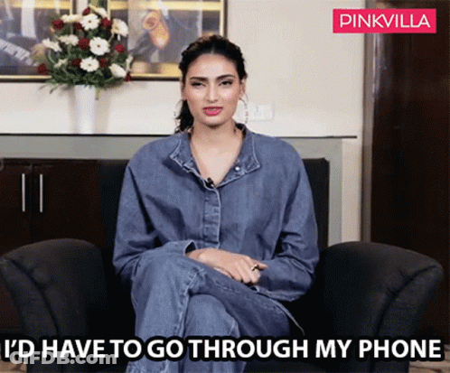 Woman In Chair Saying I'd Have To Go Through My Phone GIF