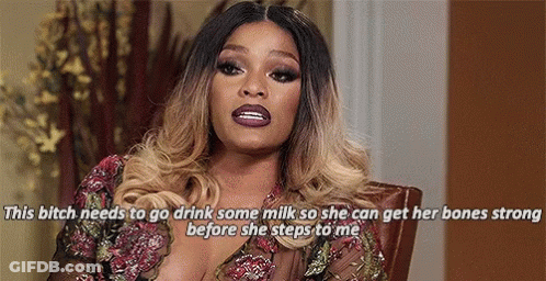 Woman In Chair Talking About Milk GIF