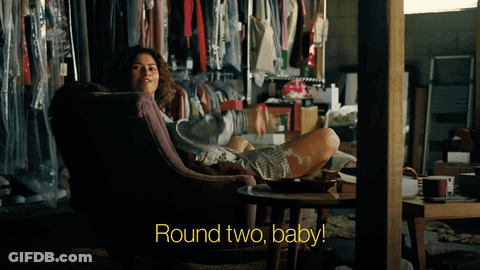Woman In Chair With Feet Up Round Two Baby GIF