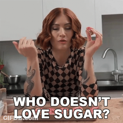 Woman In Checkered Shirt Saying Who Doesn't Love Sugar GIF