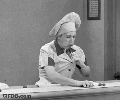 Woman In Chef Hat Eating Food GIF