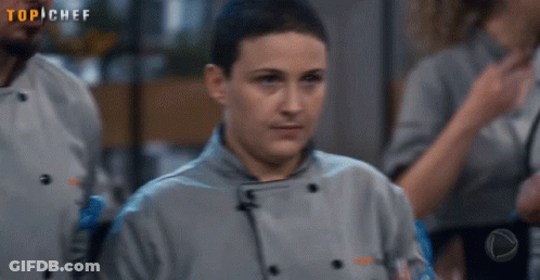 Woman In Chef Uniform With Top Chef GIF