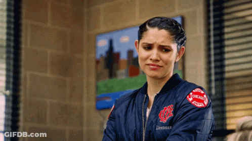Woman In Chicago Fire Department Jacket GIF