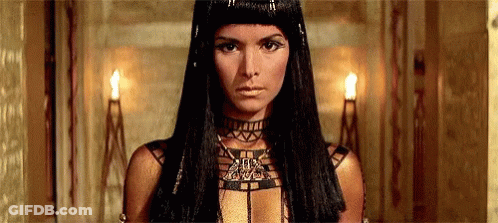 Woman In Choker And Necklace With Long Black Hair GIF
